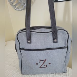 Grey/taupe color tote but more sophisticated 😉
